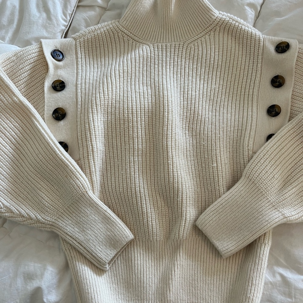 Beige turtle neck sweater with button off sleeves